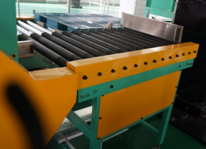 Robot pick up conveyor